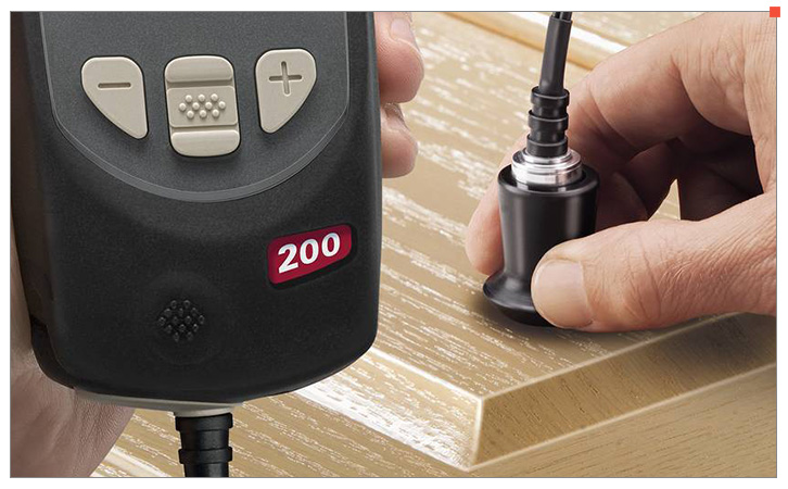 Detail of the button of the Defelsko Positector 200 series ultrasonic Thickness Gauge