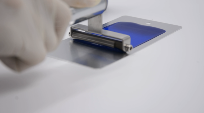 The case of preparing the adhesive layer with a coating wire rod is shown in Figure 1