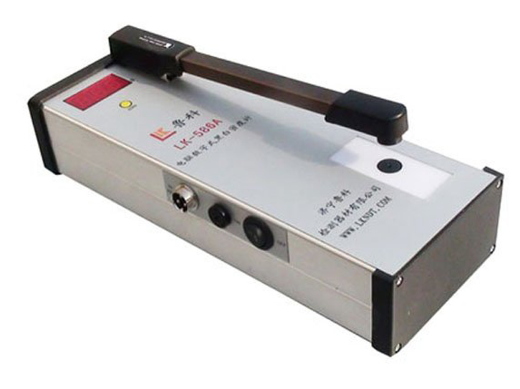 Luco inspects the LK-586 monochrome density meter