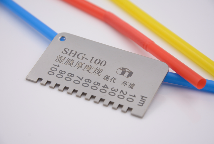 Determination of dry film thickness of roof coating with wet hygrometer with Figure 1