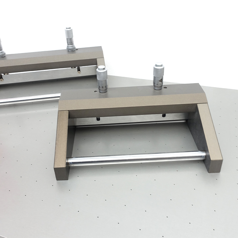 A detailed description of the adjustable Film Applicator with Figure 1