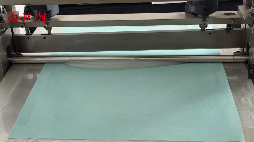 Application of laboratory coater on release paper with glue [video demonstration] Figure 1